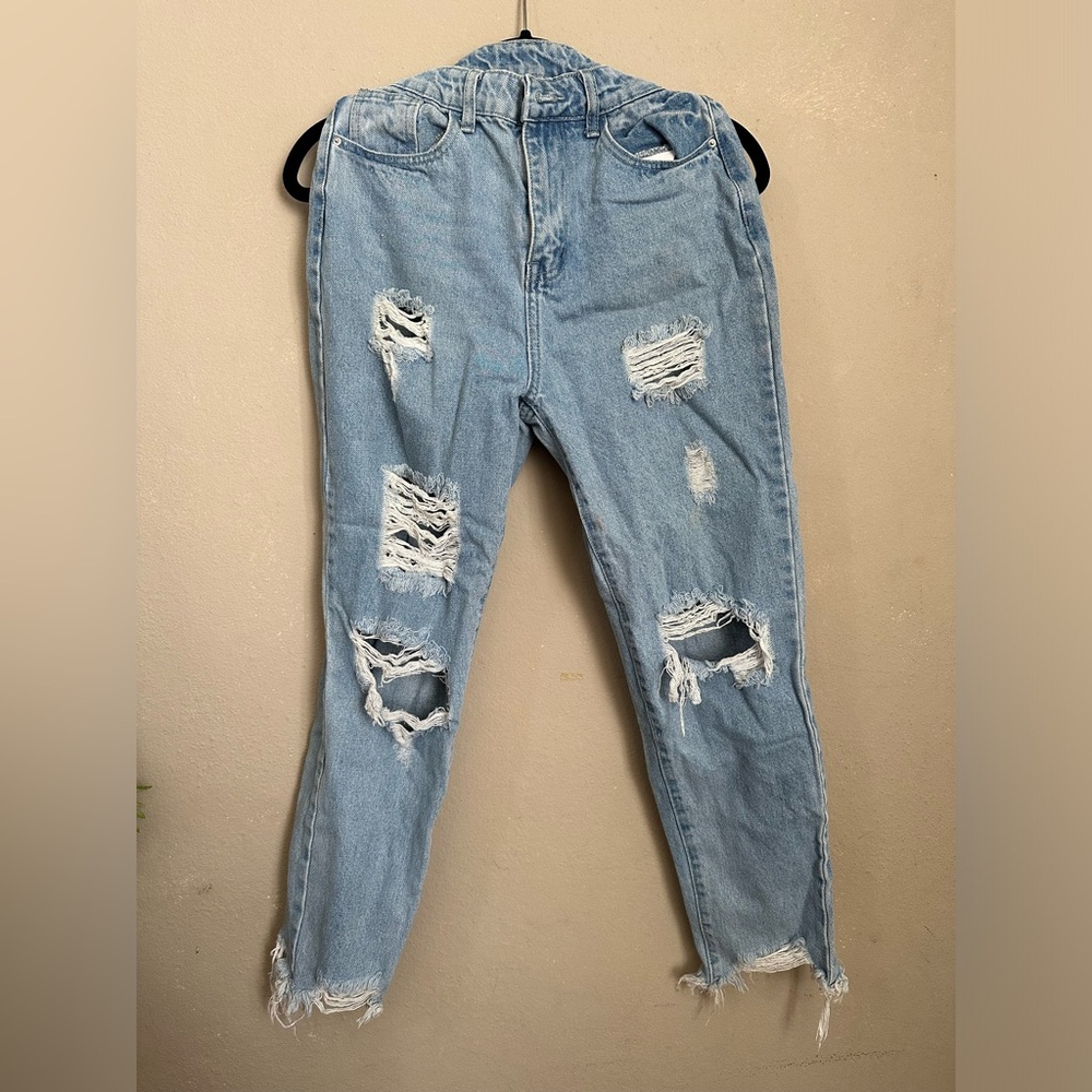 Ripped jeans size Small.